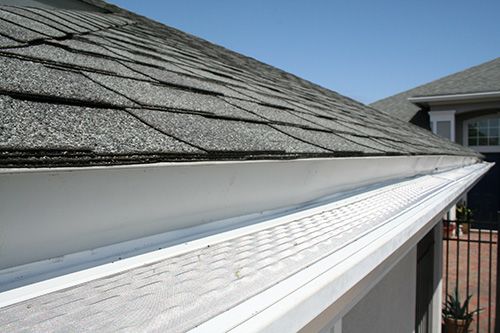 Gutter and Gutter Guards System